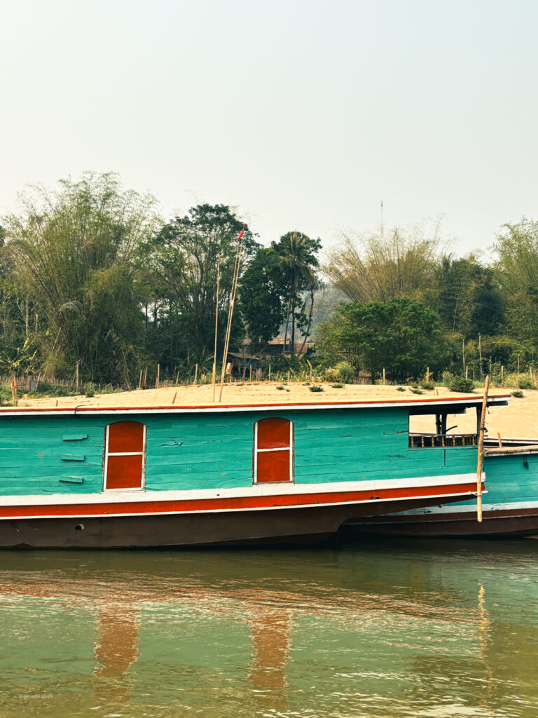 Laos slow boat on the River Mekong in Laos