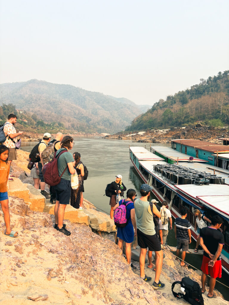 Passengers waiting to board the slow boat in Pakbeng, Laos