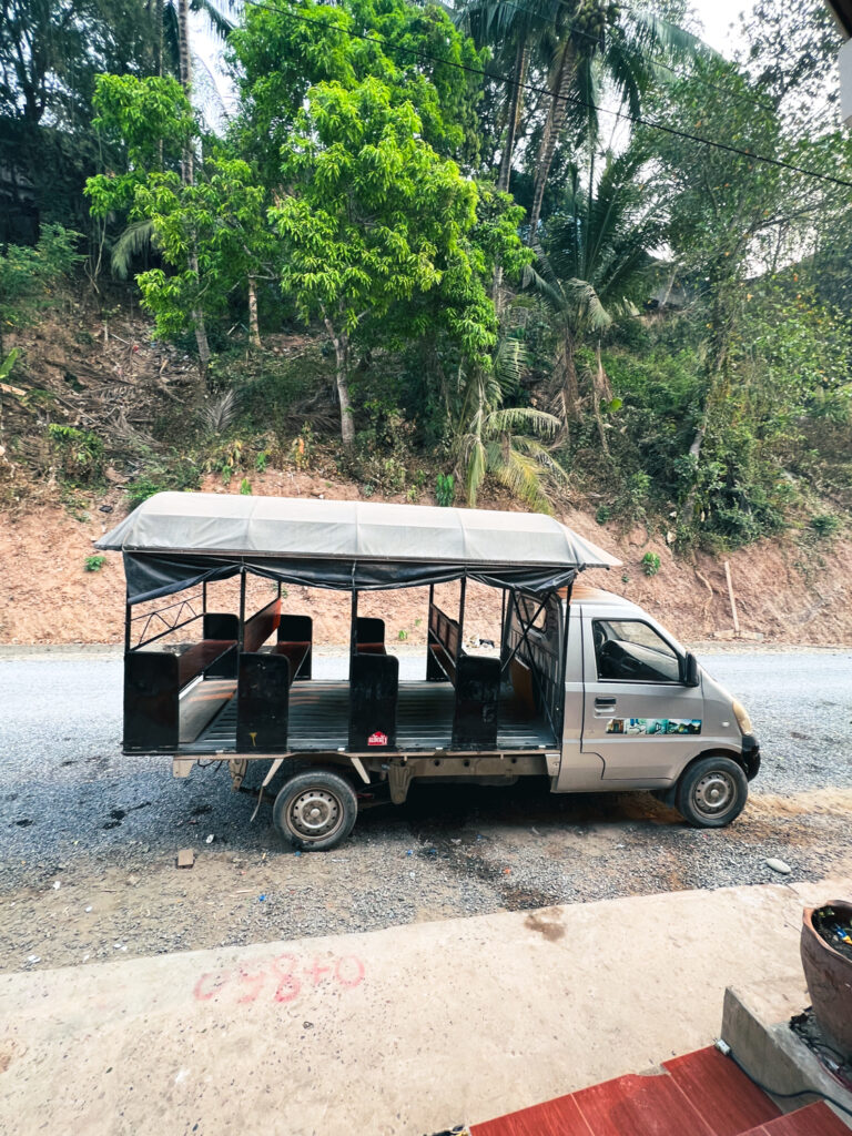 A tuktuk waiting to take passengers from the border in Huay Xai to the slow boat pier 