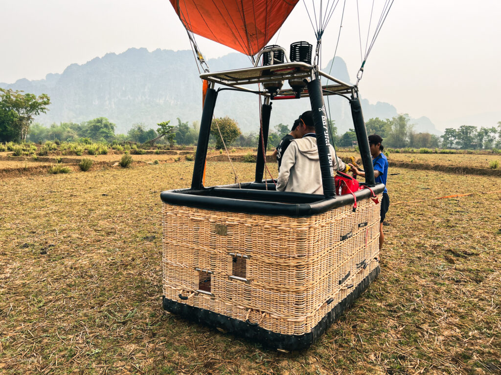 Hot air balloon after landing in Vang Vieng, Laos