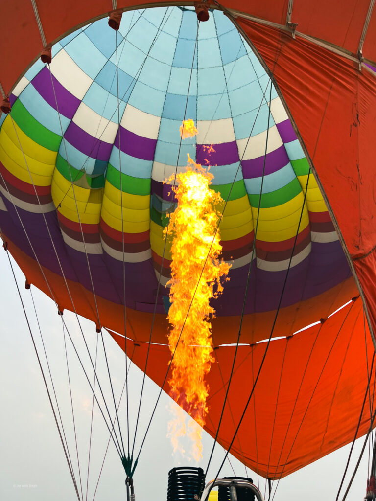 Fire powering a hot air balloon in Vang Vieng, Laos