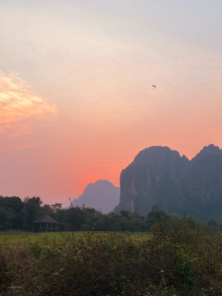 Paramotoring in Vang Vieng in Laos at sunrise