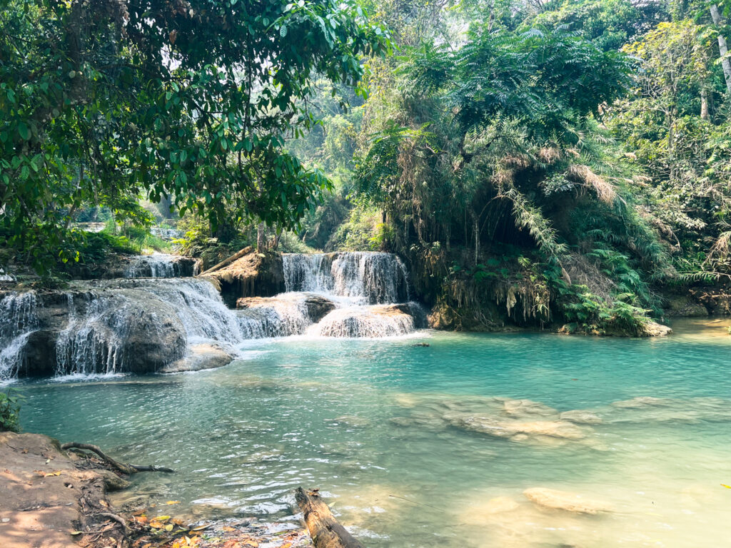 Blue pool down-river of Kuang Si Waterfall